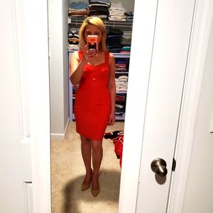 Red bodycon dress by Guess.